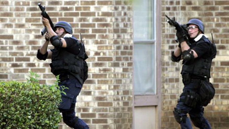 Swat unit aims at sniper 2006 AP